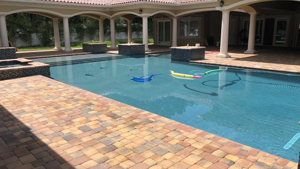 Grand custom pool with columned Mediterranean pavilion and paver patio, Wesley Chapel FL